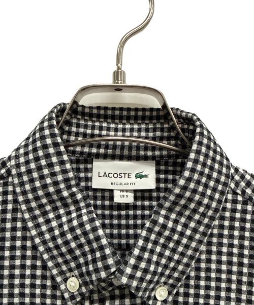 LACOSTE（ラコステ）LACOSTE (ラコステ) 半袖シャツ ブラック×ホワイト サイズ:Sの古着・服飾アイテム