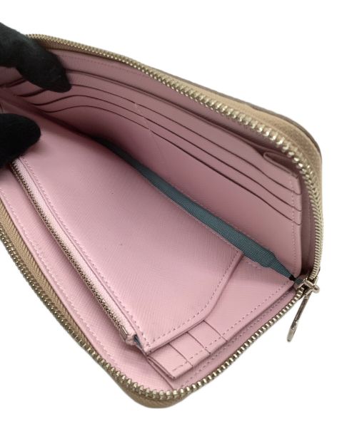 A.D.M.J.（エーディーエムジェイ）A.D.M.J. (エーディーエムジェイ) 長財布 ベージュ×ピンクの古着・服飾アイテム