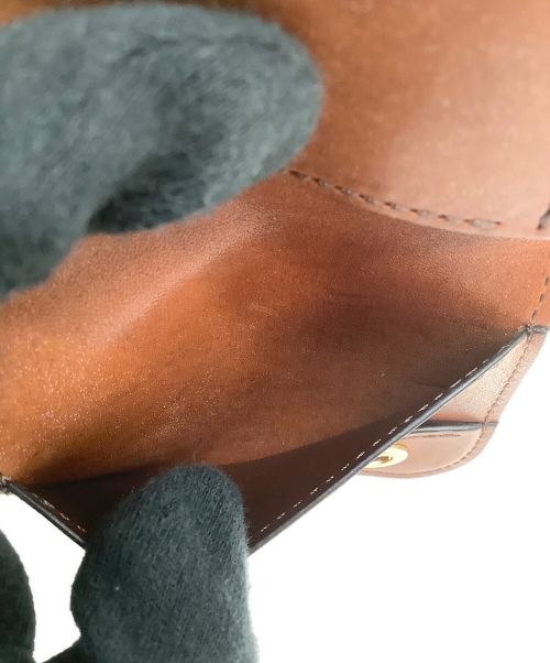 WILDSWANS（ワイルドスワンズ）WILDSWANS (ワイルドスワンズ) 2つ折り財布 ブラウンの古着・服飾アイテム