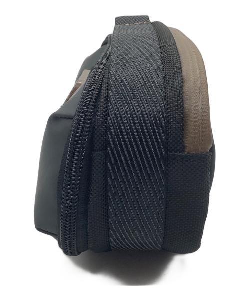 TUMI（トゥミ）TUMI (トゥミ) ショルダーポーチ グレーの古着・服飾アイテム