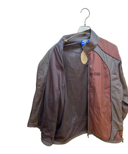 UMBRO（アンブロ）UMBRO (アンブロ) SEDAN ALL-PURPOSE (セダンオールパーパス) ナイロンジャケット ブラウン×グレー サイズ:Mの古着・服飾アイテム