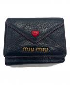 MIU MIUミュウミュウ）の古着「コンパクトウォレット」｜レッド×ブラック