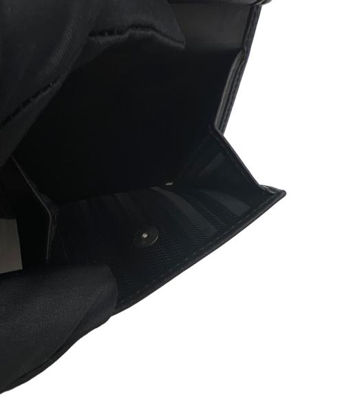 PAUL SMITH（ポールスミス）PAUL SMITH (ポールスミス) 2つ折り財布 ネイビー×ブラックの古着・服飾アイテム