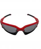 OAKLEYオークリー）の古着「サングラス」｜レッド×ブラック