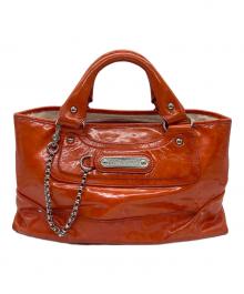 CELINE（セリーヌ）の古着「ハンドバッグ/パテントレザー」｜オレンジ