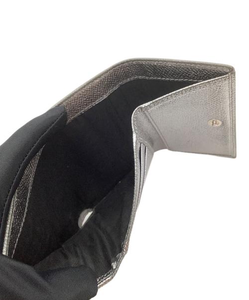 DOLCE & GABBANA（ドルチェ＆ガッバーナ）DOLCE & GABBANA (ドルチェ＆ガッバーナ) コンパクトウォレット シルバーの古着・服飾アイテム