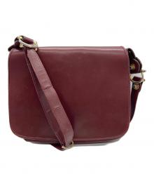 must de cartier（マストドゥカルティエ）の古着「フラップショルダーバッグ」｜ボルドー