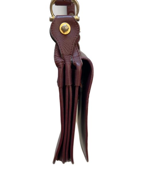 must de cartier（マストドゥカルティエ）must de cartier (マストドゥカルティエ) フラップショルダーバッグ ボルドーの古着・服飾アイテム