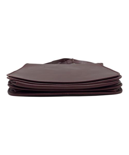 must de cartier（マストドゥカルティエ）must de cartier (マストドゥカルティエ) フラップショルダーバッグ ボルドーの古着・服飾アイテム