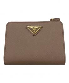 PRADA（プラダ）の古着「2つ折り財布」｜ベージュ