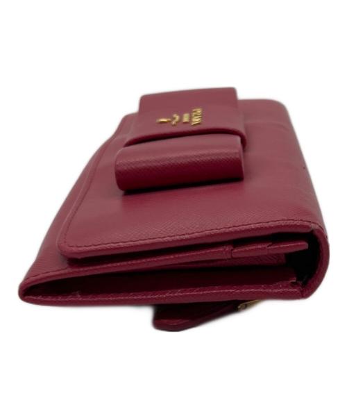 PRADA（プラダ）PRADA (プラダ) サフィアーノリボン長財布 ピンクの古着・服飾アイテム