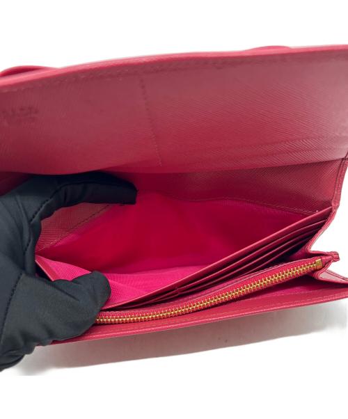 PRADA（プラダ）PRADA (プラダ) サフィアーノリボン長財布 ピンクの古着・服飾アイテム