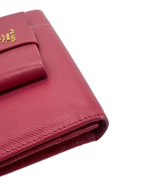 PRADA（プラダ）PRADA (プラダ) サフィアーノリボン長財布 ピンクの古着・服飾アイテム