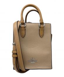 COACH（コーチ）の古着「2WAYバッグ」｜ブラウン×アイボリー