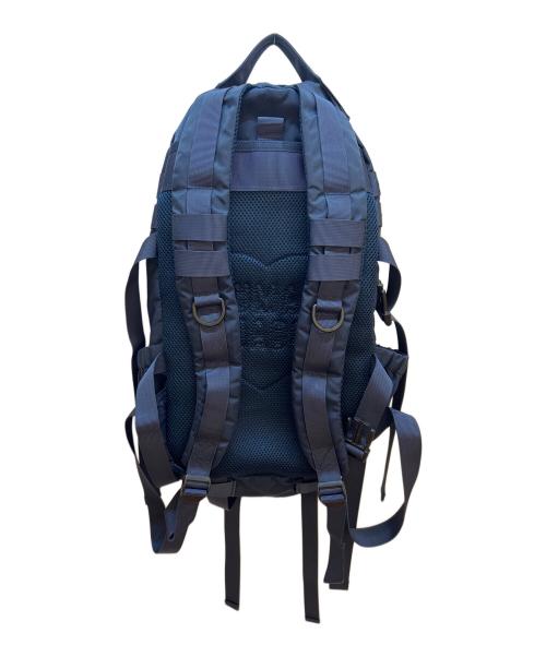 HUMAN MADE（ヒューマンメイド）HUMAN MADE (ヒューマンメイド) リュック ネイビー×オレンジ×レッドの古着・服飾アイテム