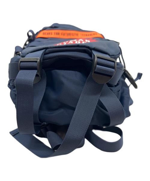 HUMAN MADE（ヒューマンメイド）HUMAN MADE (ヒューマンメイド) リュック ネイビー×オレンジ×レッドの古着・服飾アイテム