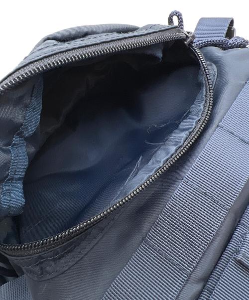 HUMAN MADE（ヒューマンメイド）HUMAN MADE (ヒューマンメイド) リュック ネイビー×オレンジ×レッドの古着・服飾アイテム