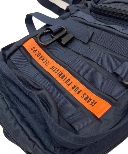 HUMAN MADE（ヒューマンメイド）HUMAN MADE (ヒューマンメイド) リュック ネイビー×オレンジ×レッドの古着・服飾アイテム