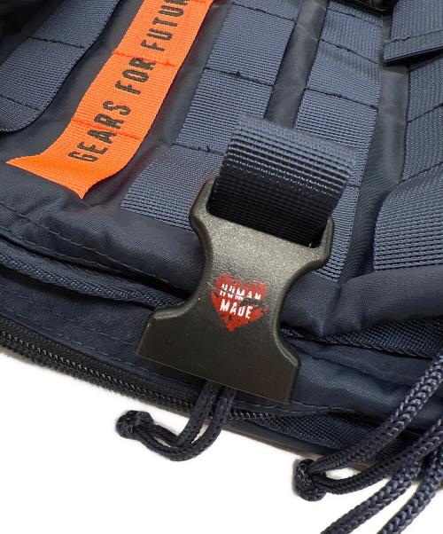 HUMAN MADE（ヒューマンメイド）HUMAN MADE (ヒューマンメイド) リュック ネイビー×オレンジ×レッドの古着・服飾アイテム