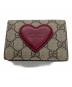 GUCCI（グッチ）の古着「2つ折り財布」｜ベージュ