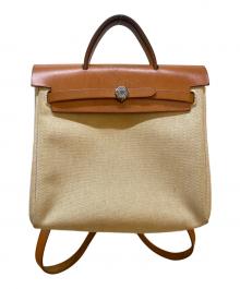 HERMES（エルメス）の古着「リュック」｜ベージュ×ブラウン