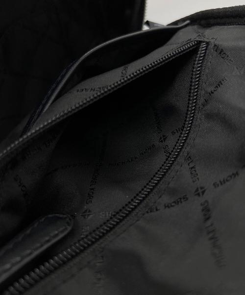 MICHAEL KORS（マイケルコース）MICHAEL KORS (マイケルコース) スタッズリュック ブラックの古着・服飾アイテム