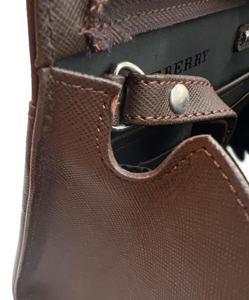 BURBERRY（バーバリー）BURBERRY (バーバリー) クラッチバッグ ブラウンの古着・服飾アイテム