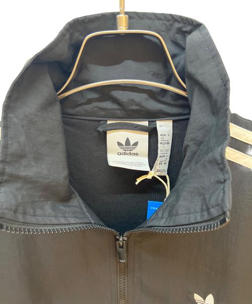adidas Originals（アディダスオリジナル）adidas Originals (アディダスオリジナル) ウーブン ファイヤーバード トラックトップ ブラック サイズ:XL 未使用品の古着・服飾アイテム