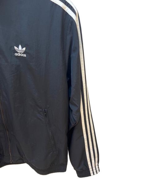 adidas Originals（アディダスオリジナル）adidas Originals (アディダスオリジナル) ウーブン ファイヤーバード トラックトップ ブラック サイズ:XL 未使用品の古着・服飾アイテム