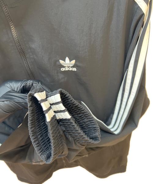 adidas Originals（アディダスオリジナル）adidas Originals (アディダスオリジナル) ウーブン ファイヤーバード トラックトップ ブラック サイズ:XL 未使用品の古着・服飾アイテム