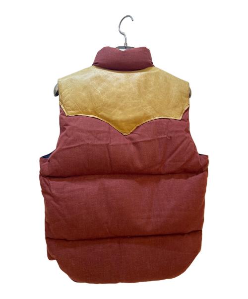 RockyMountainFeatherBed（ロッキーマウンテンフェザーベッド）RockyMountainFeatherBed (ロッキーマウンテンフェザーベッド) WAREHOUSE (ウエアハウス) ダウンベスト ブラウン サイズ:38の古着・服飾アイテム
