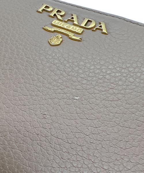PRADA（プラダ）PRADA (プラダ) ラウンドファスナー財布 ベージュの古着・服飾アイテム