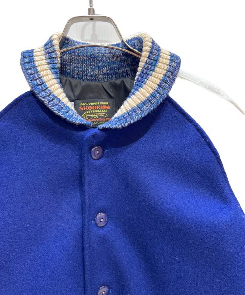 skookum（スクーカム）skookum (スクーカム) スタジャン ホワイト×ブルー サイズ:38の古着・服飾アイテム