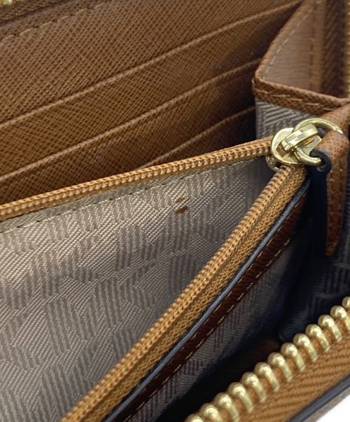 MICHAEL KORS（マイケル・コース）MICHAEL KORS (マイケルコース) MICHAEL KORS ラウンドファスナー財布 ブラウンの古着・服飾アイテム