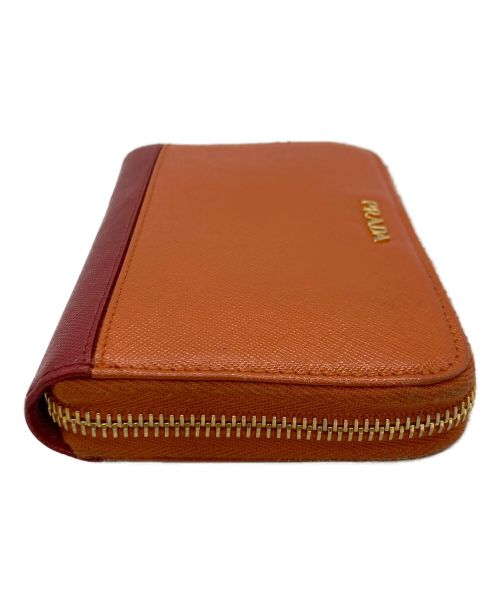 PRADA（プラダ）PRADA (プラダ) PRADA ラウンドファスナー財布 オレンジ×レッドの古着・服飾アイテム