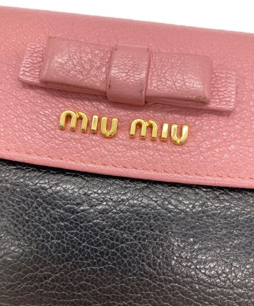 MIU MIU（ミュウミュウ）MIU MIU (ミュウミュウ) miumiu  バイカラーがま口財布 ブラック×ピンクの古着・服飾アイテム