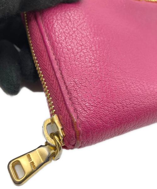 MIU MIU（ミュウミュウ）MIU MIU (ミュウミュウ) 長財布 ショッキングピンクの古着・服飾アイテム