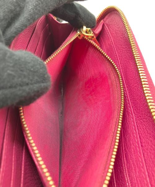 MIU MIU（ミュウミュウ）MIU MIU (ミュウミュウ) 長財布 ショッキングピンクの古着・服飾アイテム