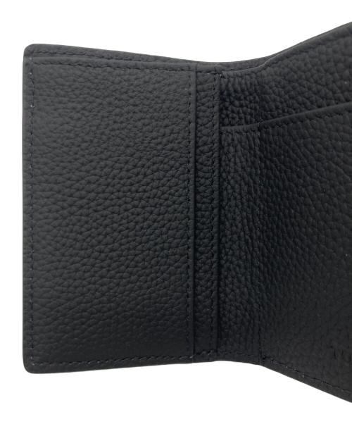 tov（トーヴ）tov (トーヴ) TOV リボンウォレット ブラックの古着・服飾アイテム