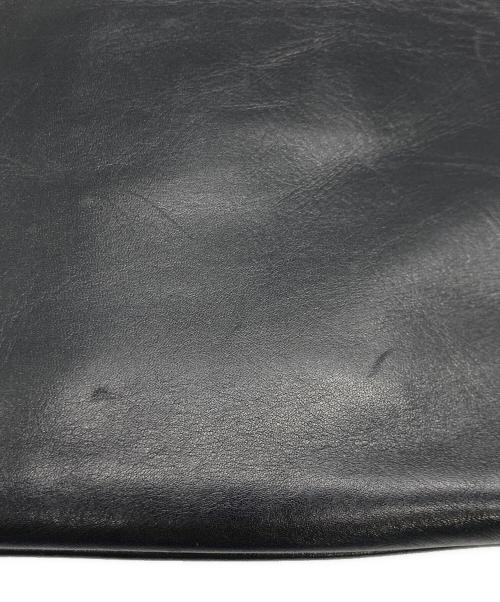 COMME des GARCONS（コムデギャルソン）COMME des GARCONS (コムデギャルソン) JUNYA WATANABE COMME des GARCONS スタッズクラッチバッグ ブラック×ゴールドの古着・服飾アイテム