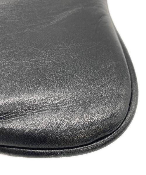 COMME des GARCONS（コムデギャルソン）COMME des GARCONS (コムデギャルソン) JUNYA WATANABE COMME des GARCONS スタッズクラッチバッグ ブラック×ゴールドの古着・服飾アイテム