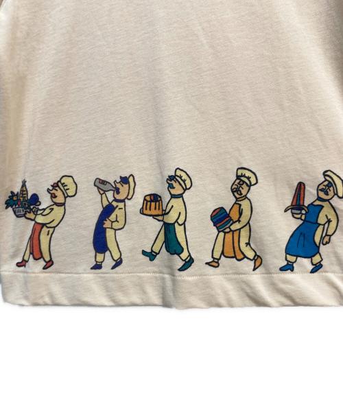 SHINYA KOZUKA（シンヤコズカ）SHINYA KOZUKA (シンヤコズカ) SHINYA KOZUKA（シンヤコズカ）プリントTシャツ アイボリー×オレンジ サイズ:Mの古着・服飾アイテム