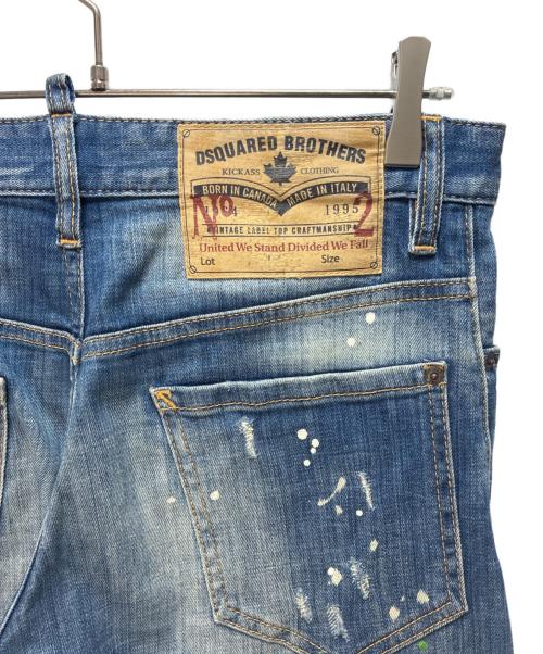 DSQUARED2（ディースクエアード）DSQUARED2 (ディースクエアード) ダメージペイントデニムパンツ ネイビー サイズ:SIZE 46の古着・服飾アイテム