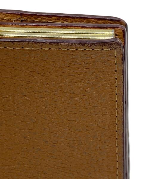 Vivienne Westwood（ヴィヴィアンウエストウッド）Vivienne Westwood (ヴィヴィアンウエストウッド) Vivienne Westwood 口金二つ折りミニ財布 ブラウンの古着・服飾アイテム