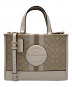 COACHコーチ）の古着「デンプシーキャリーオールシグネチャージャガードストライプ」｜ベージュ×ピンクベージュ