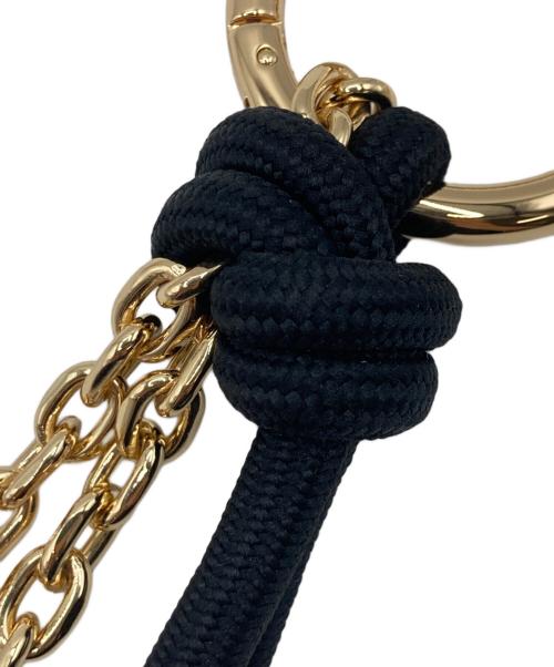 MICHAEL KORS（マイケル・コース）MICHAEL KORS (マイケル・コース) ゴールドストーン＆コードバッグチャーム ゴールド×ブラック 未使用品の古着・服飾アイテム