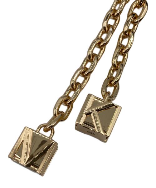 MICHAEL KORS（マイケル・コース）MICHAEL KORS (マイケル・コース) ゴールドストーン＆コードバッグチャーム ゴールド×ブラック 未使用品の古着・服飾アイテム