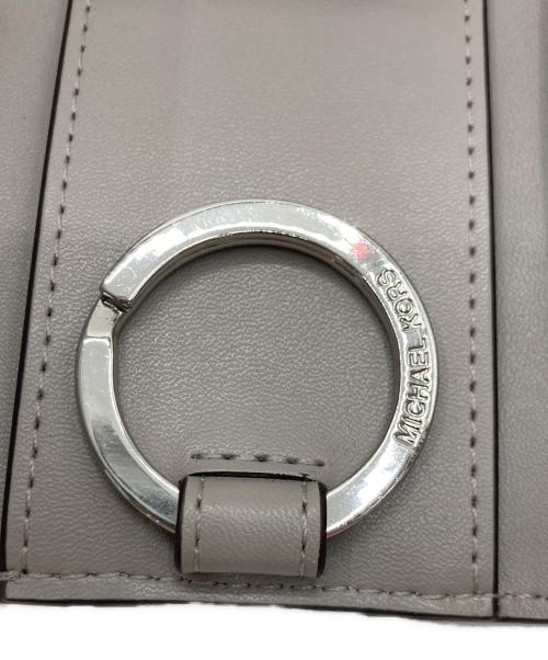 MICHAEL KORS（マイケル・コース）MICHAEL KORS (マイケル・コース) MICHAEL KORS（マイケル・コース）キーケース グレーの古着・服飾アイテム