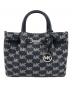 MICHAEL KORS（マイケル・コース）の古着「CARSON センタージップ サッチェル スモール MKシグネチャー」｜ブラック×ホワイト