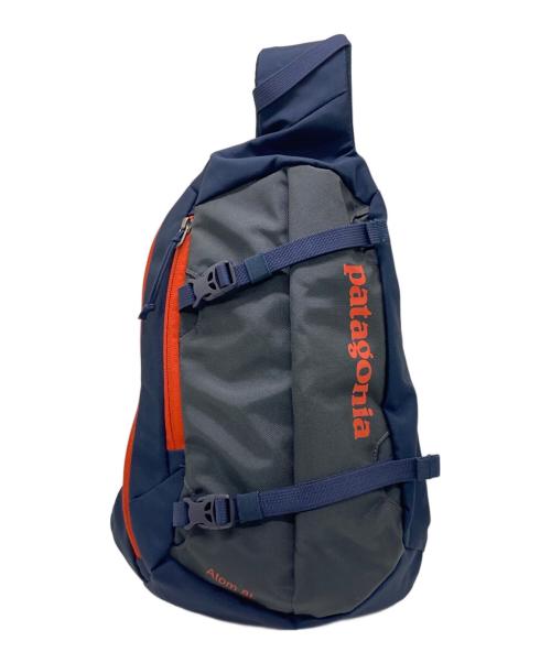 Patagonia（パタゴニア）Patagonia (パタゴニア) アトムスリング8L ボディーバッグ ネイビー×オレンジの古着・服飾アイテム